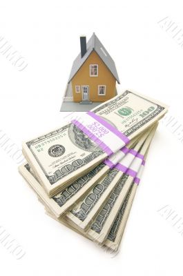 Home and Stacks of Money Isolated