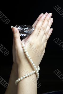 Diamond on praying hands