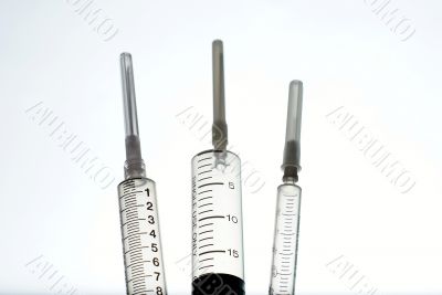 Three medical syringes