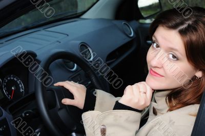 The girl in the car.