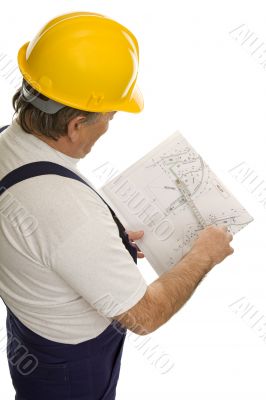 Construction worker with plan of an architect