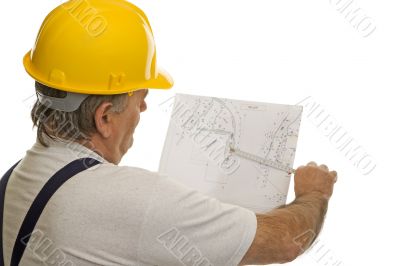 Construction worker with plan of an architect