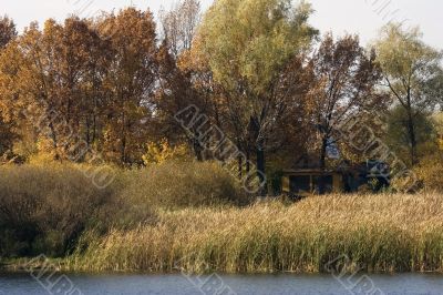 Little house in a rural place in autumn