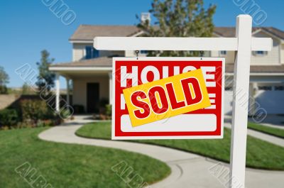 Sold Home for Sale Real Estate Sign and House