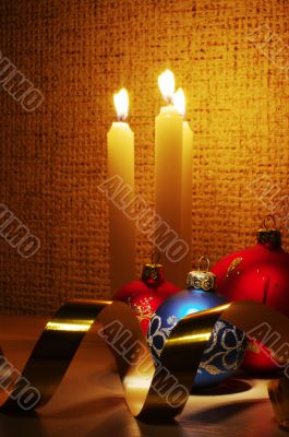 candles, balls and gold ribbons it are Christmas