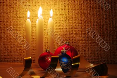 candles, balls and gold ribbons it are Christmas