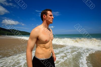 Man standing on exotic beach