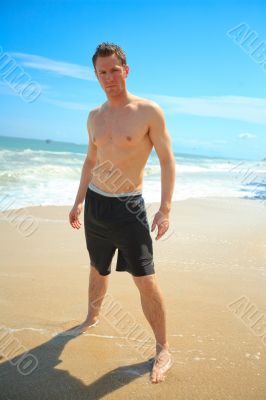 Man standing on exotic beach