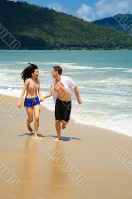 running on a paradise beach