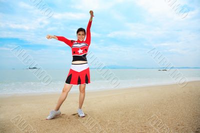 happy fun jump at the beach