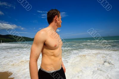 Man standing on exotic beach