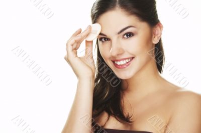 young woman with cosmetic petal