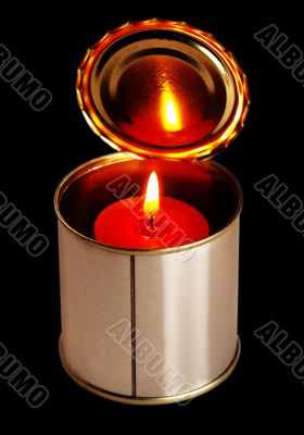 candle on a tin can