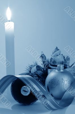 Santa in candles light and christmas ball