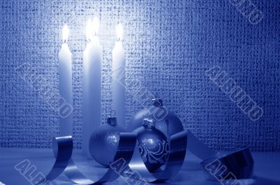 candles, balls and ribbons it are Christmas by cold color