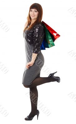 Shopping. Beautiful girl with bag.