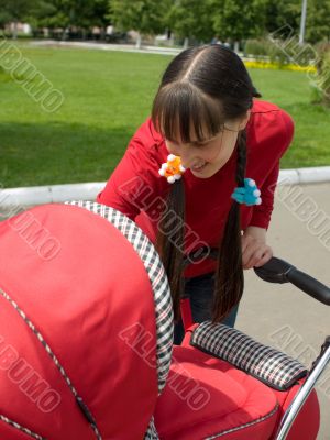 Woman with baby carriage