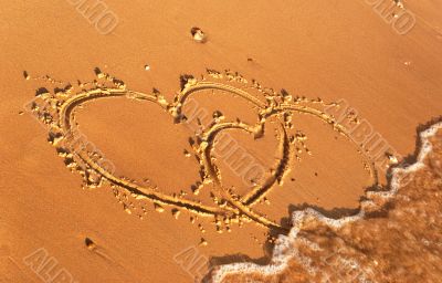 heart written on the sand