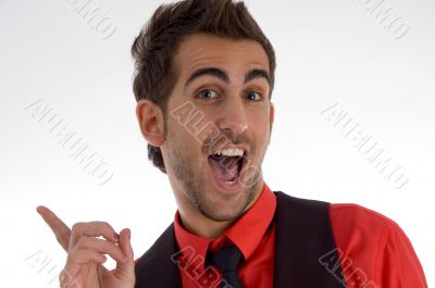 cheerful man pointing backside
