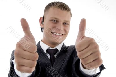 successful executive with thumbs up hand gesture