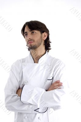 young chef with folded hands