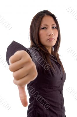female showing thumbs down sign