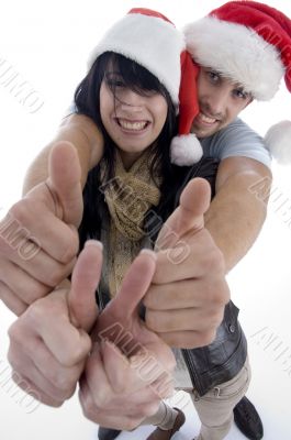 young couple with chritsmas hat