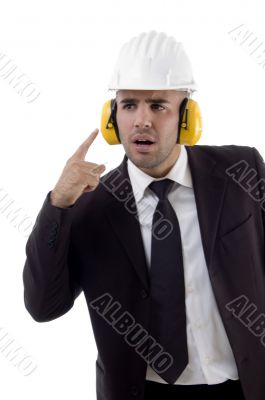 male engineer wearing earplugs