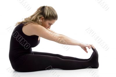 side view of female doing exercise