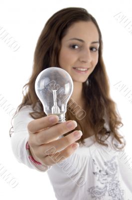 young female showing light bulb