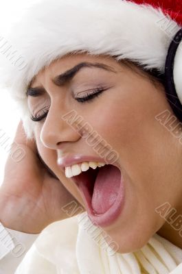 lovely young girl posing with christmas hat