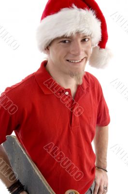 smiling male wearing christmas hat