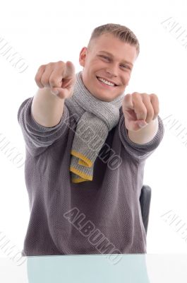 young man pointing you with both hands