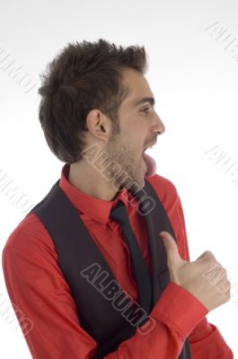 handsome man pulling his face