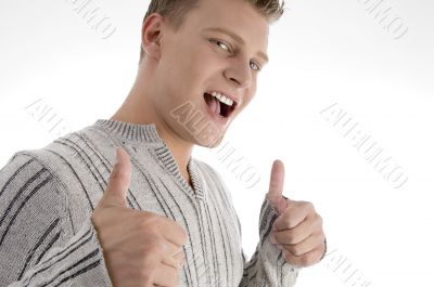 handsome man showing thumbs up
