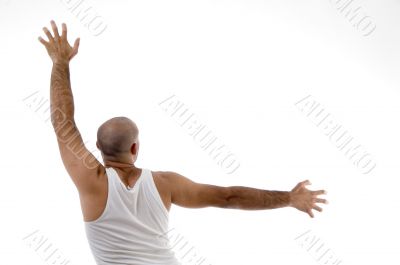 back pose of male doing exercise