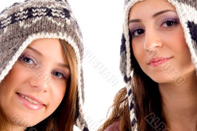 two young friends wearing woolen cap