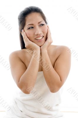 young woman posing in towel