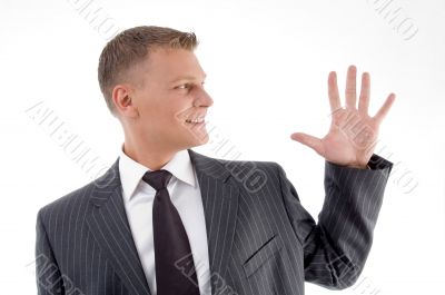 portrait of businessman counting fingers