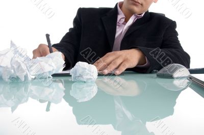 businessman writing on notepad
