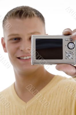happy man holding digital camera