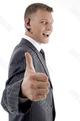 successful businessman showing thumbs up