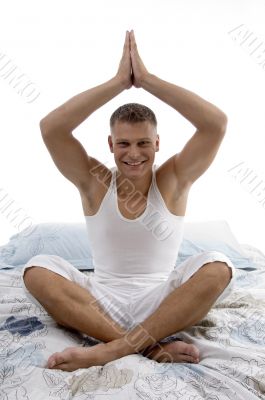 handsome man practicing yoga