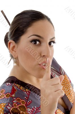 woman showing keep shushing sign