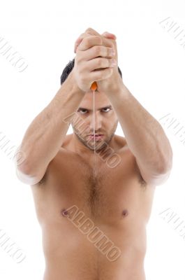 muscular man posing with knife