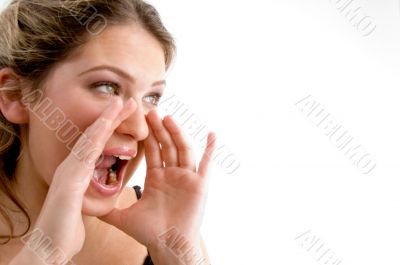beautiful young woman bellowing someone