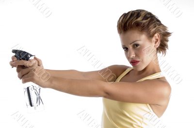 woman with spray bottle