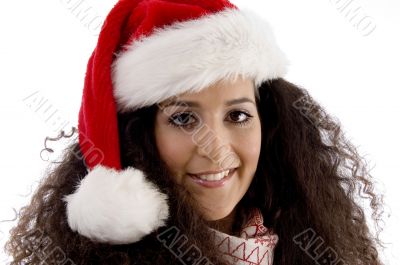 close view of young woman wearing christmas hat