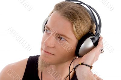 young male busy with headphones