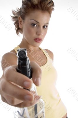 woman posing with spray bottle